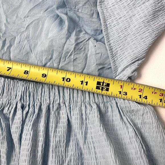 Anisa Peplum Jessie Bow Back Blouse in Light Blue by Francesca’s - Picture 13 of 16